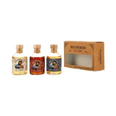 Bud Spencer The Legend Tasting Set. Drei kleine Flaschen mit bernsteinfarbendem Inhalt und braune Geschenkverpackung.