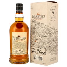 Elsburn The Harz Whisky. Flasche mit beigem Etikett mit schwarze Elsburn The Harz Aufschrift und rotem Siegel mit beiger Geschenkverpackung.