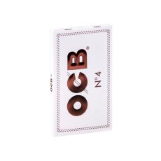 Heft OCB Zigarettenpapier Weiss No. 4. Weiße Packung mit brauner OCB und Nummer 4 Aufschrift.