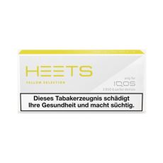 Packung Tabaksticks IQOS HEETS Yellow Selection 20 Stück. Graue Packung mit gelbem Heets Logo.
