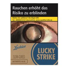 Schachtel Zigaretten Lucky Strike Authentic Blau. Beige Packung mit blauem Lucky Strike Logo und Auge.