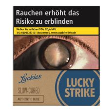 Schachtel Zigaretten Lucky Strike Authentic Blau Giga. Beige Packung mit blauem Lucky Strike Logo und Auge.